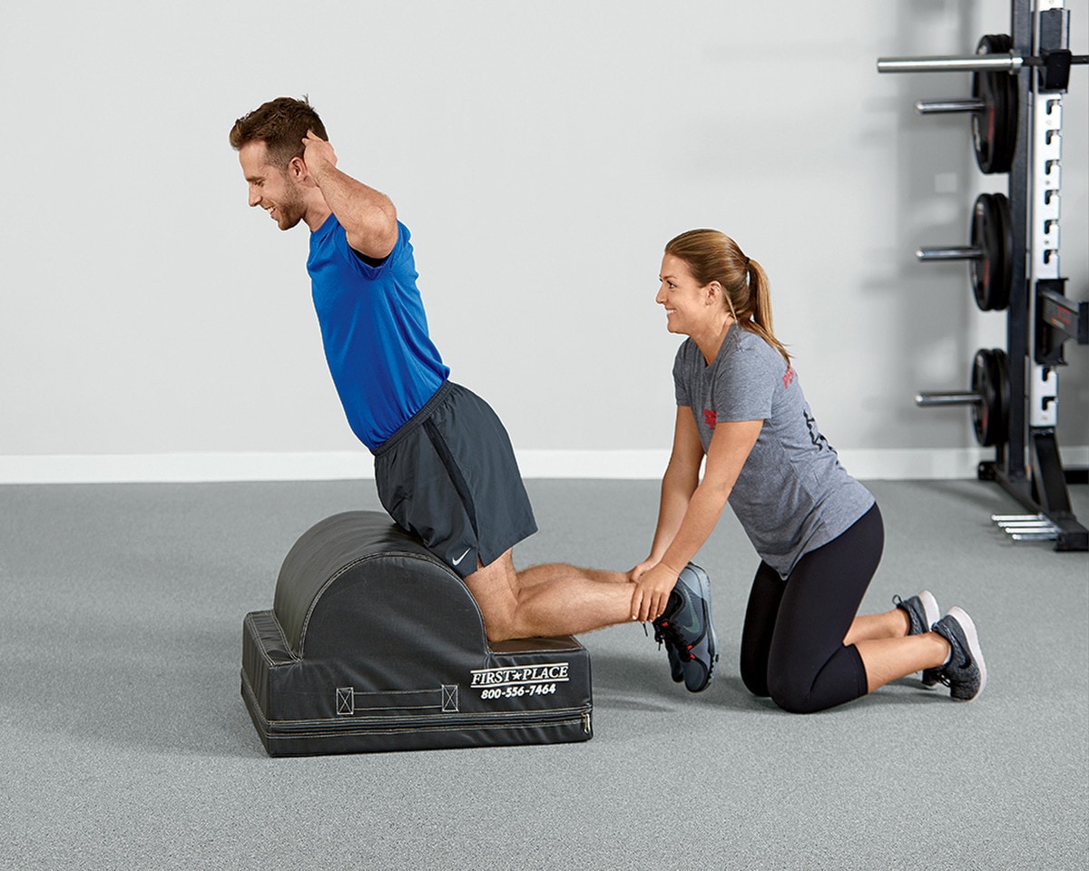 Exercising with the Foam Glute Ham Bench