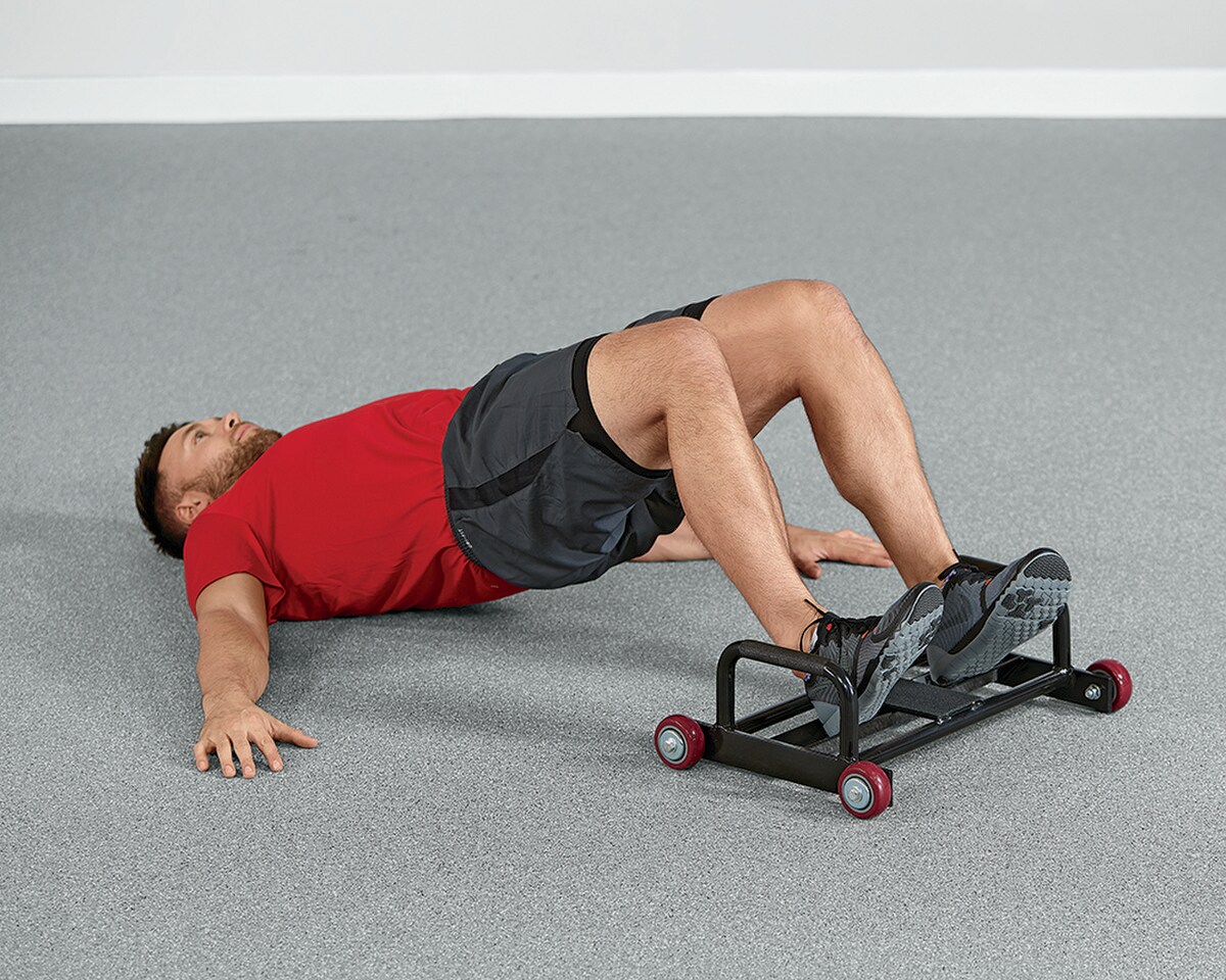 Doing Glute Bridges with the Glute Bridge Roller